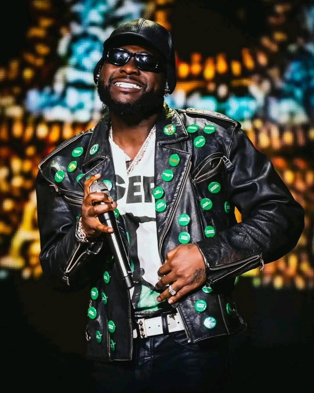 Davido Turns World Cup Stage Into Protest, Wears Jacket Bearing Names of Abducted Oyo Pupils